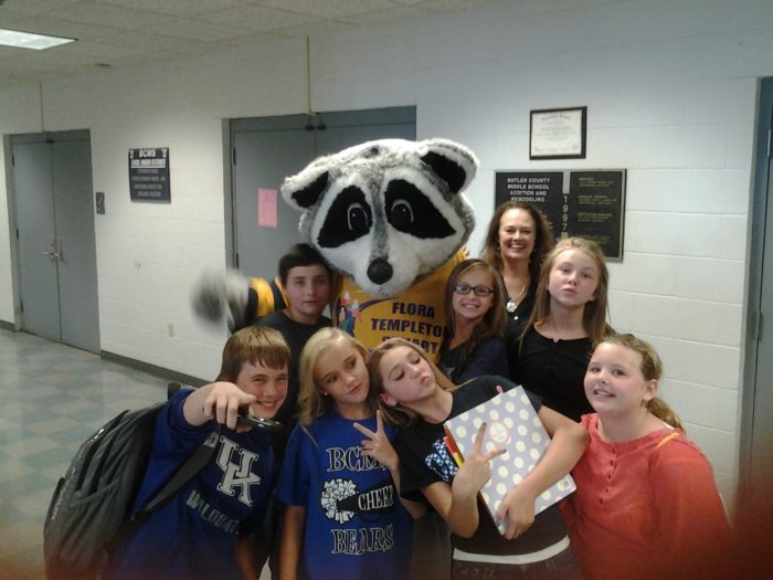 Poppy and Flora take selfies with the students