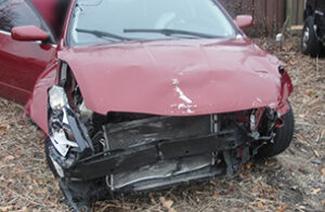 Image of a car wreck without a bumper