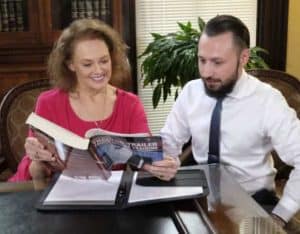 Picture of Kentucky injury attorneys, Flora Stuart & Kent Brown, working on a case