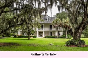 A two-story white plantation house with a large porch, once home to Southern Belle Elise Talmage Lieb, stands among manicured lawns and oak trees draped in Spanish moss, echoing stories of grace and empowerment.