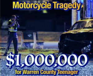 A police officer photographs a damaged vehicle at night. Text reads: "Motorcycle Accident Tragedy—$1,000,000 Settlement for Warren County Teenager.
