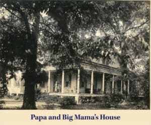 Black-and-white photo of a large house with a wide front porch, surrounded by trees. The text at the bottom reads, "Papa and Big Mama’s House," once visited by Judge Clay Elliott on his journey from Scotland to Louisiana.